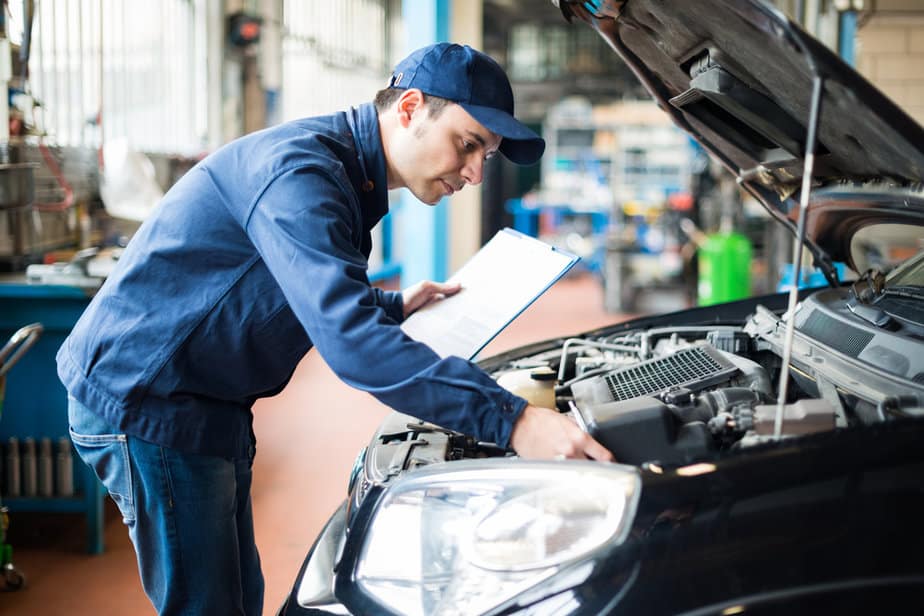 Car inspector inspecting car