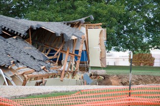 home destroyed by sinkhole